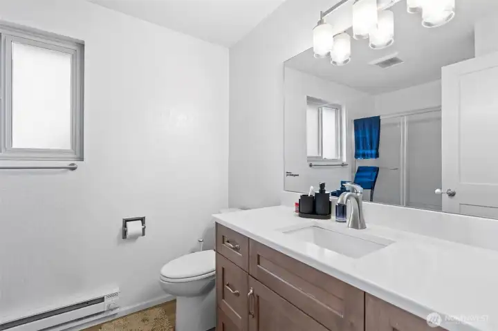 Upper unit refreshed full size bath. Optimal counter space and storage cabinets!