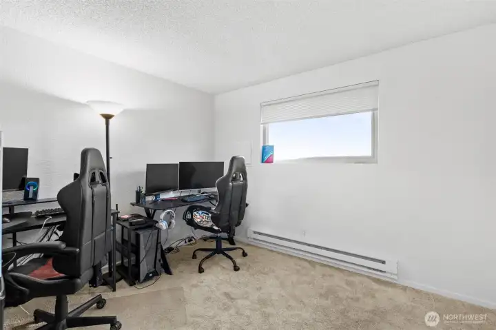 The second bedroom of an upper level unit.