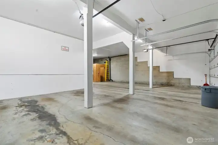 The garage is attached and has a gated pedestrian access from the main street level.