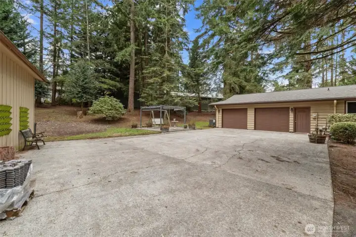 Parking area between home and shed