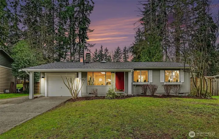 Charming rambler with modern touches & expansive fully-fenced yard.