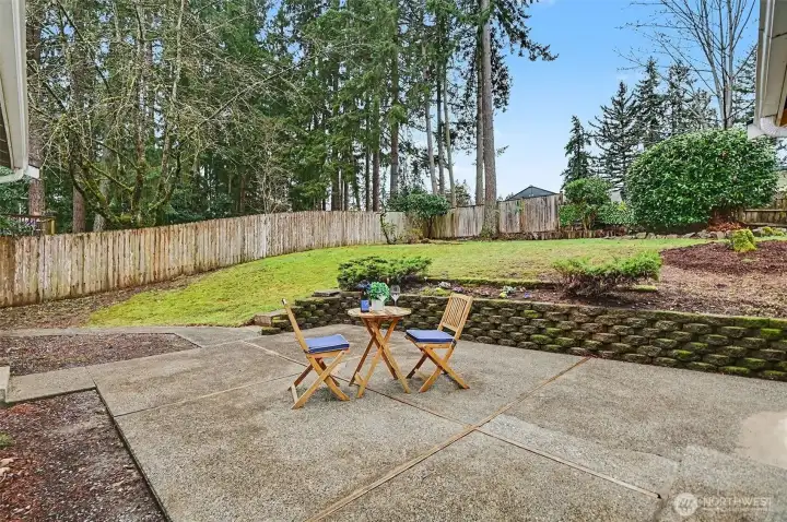 A gardener's paradise! Generous fully-fenced yard and entertainment patio.