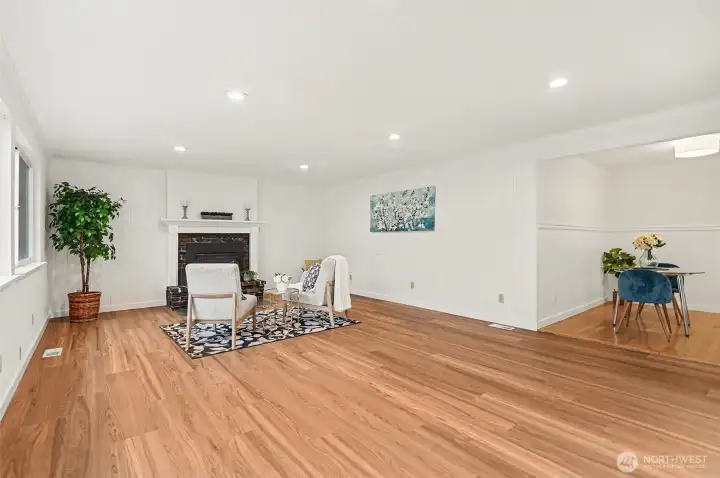 This great room is perfect for entertaining with plenty of space for the formal dining room and TV area.