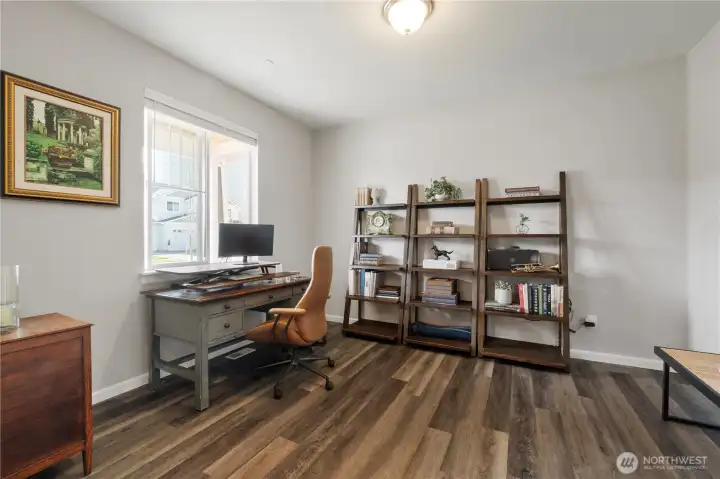 Main floor office is just inside the front door and has great natural light for your desk; or, this home has an abundance of flex space so if you don't need to use it as an office, you can furnish it for a quiet den / reading space. Either way, it's a great (big) space.