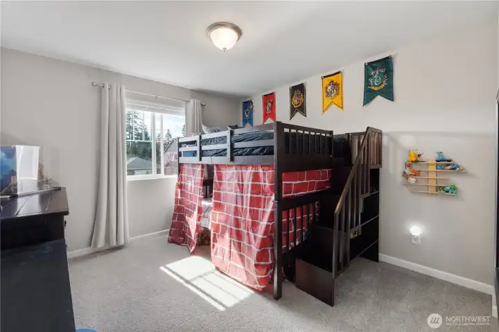 Bedroom 2 is upstairs. All bedrooms in this home are proportioned well. After all, it IS over 4100 SF total.