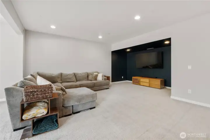 Approximately a THIRD of the downstairs bonus area. This space had a recessed section that will accommodate the LARGEST of big-screen TVs and all the streaming. audio and music components you could possibly need these days.