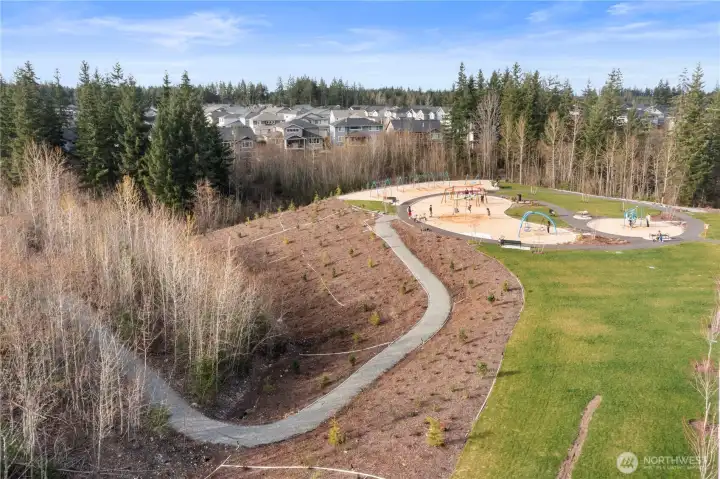 One of many (17 to be exact) community area parks, this pic is a perfect example of how neighborhood communities are connected by trails (as well as streets and houses). Must visit to truly appreciate. This is the newest of the 17 parks in Tehaleh, named Skyline Park (because of the views) - we locals call it "The Swing Park" because it is comprised of so many diffrent kinds of swings (from baby-seats to teen hang-ons). Very cool!