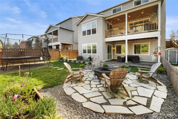 THOUSANDS of dollars of backyard landscaping and hardscaping (rock, slate, etc). Just right for seating, accommodating yard toys and even the practical and VERY IMPORATANT issue of good drainage.