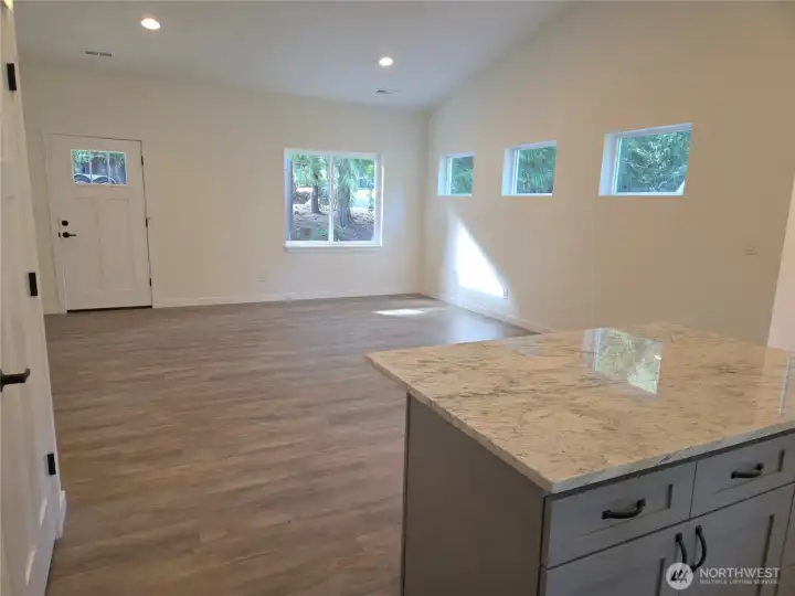 Open Floor plan living room flows to the kitchen and dining