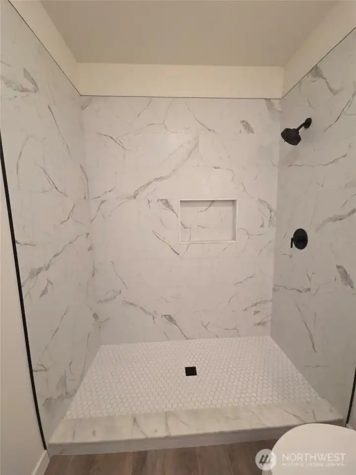 tiled shower, low curb