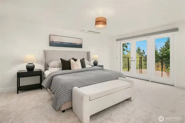 Primary bedroom with deck access.