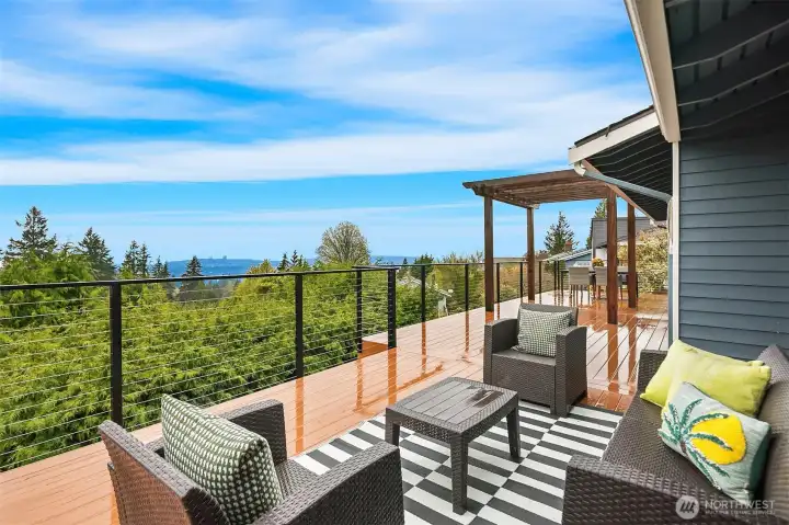 Expansive deck with views of Bellevue, Sound and mountains.