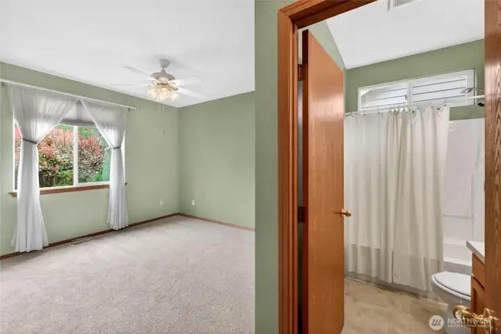 Privately positioned primary suite offers a quiet retreat at the end of the day.