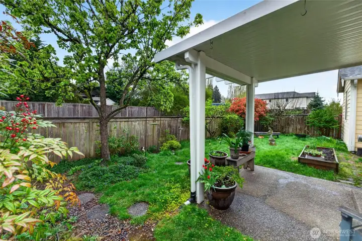 Covered patio extends your living outdoors, perfect for year-round use.