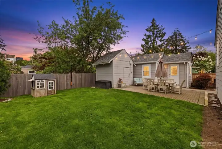 The fully fenced yard creates the perfect space for play, relaxing and entertaining