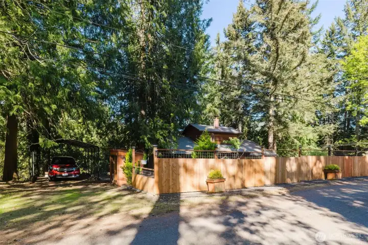 Home in the woods in Lovely Lake Tahuyeh nighborhood.  Redwood fence surrounds lovely home and garden.  Carport always has some shade.