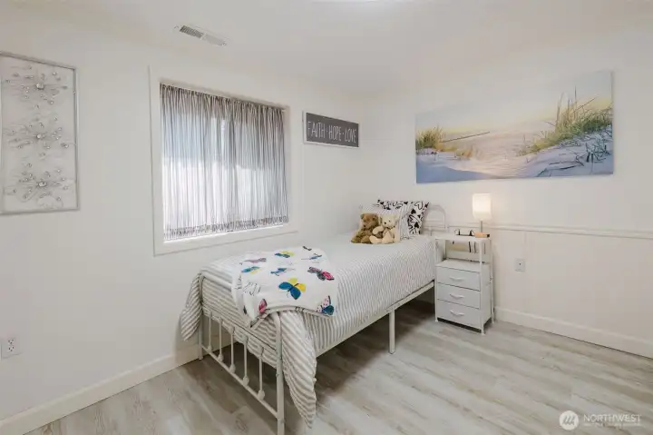 One of the bedrooms on the main floor.  Window looks toward the front of the house