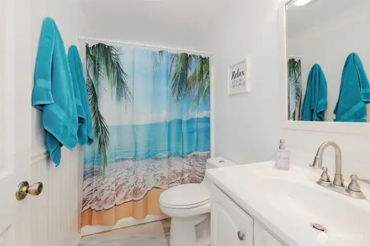 Main bath off the hallway between the two bedrooms