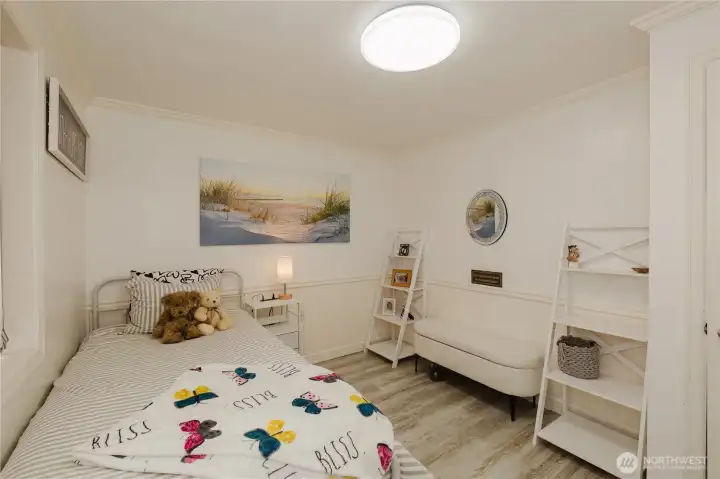 One of the bedrooms on the main floor.  Window looks toward the front of the house