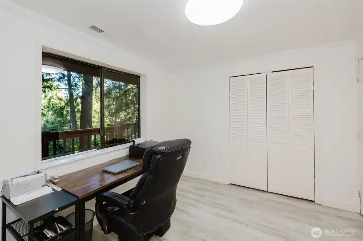 another shot of the other bedroom currently used as the office and view out the window