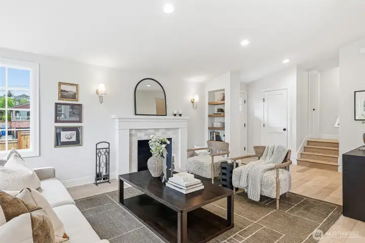Spend cozy nights in at home in this fabulous, spacious and open living area with a fireplace perfect for chilly winter evenings.