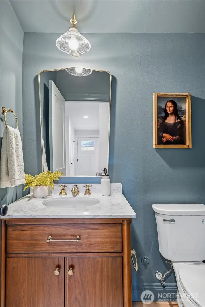 Gorgeous powder room on the main.