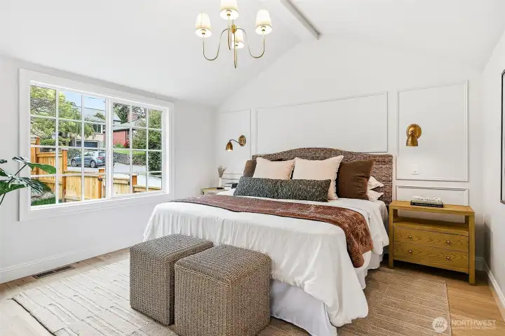 The primary is bright and spacious, yet cozy and comfortable - your ideal retreat after busy days out and about.