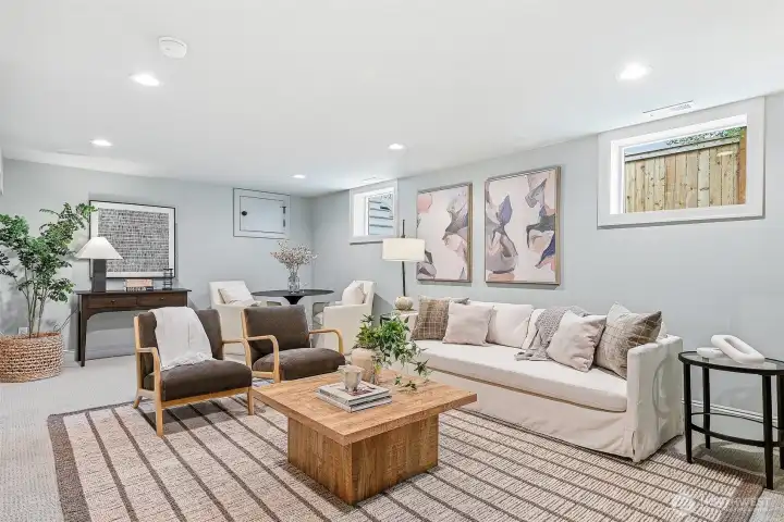 This spacious rec room is prepped and ready for Mariners games, movie nights, and fun nights at home.