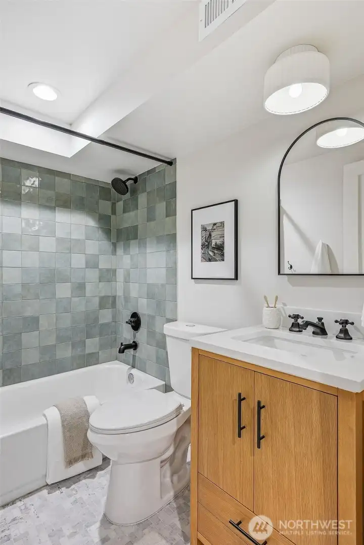 Beautifully remodeled full bathroom on the lower level.