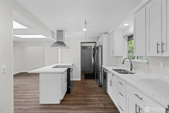 Kitchen with laundry hall Kitchen with laundry hall
