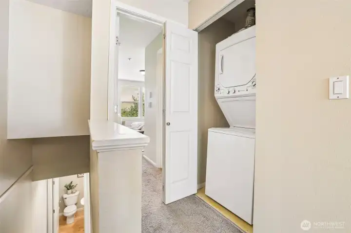 Laundry located near the bedrooms.