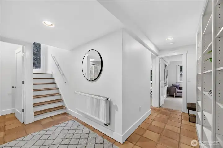 Lower level hallway with bookshelves