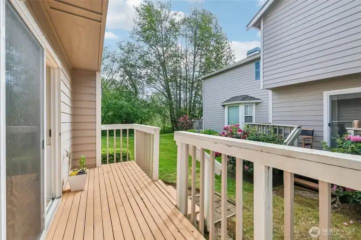 Relax, BBQ or enjoy the surrounding greenery from the private deck with an exterior storage closet. Relax, BBQ or enjoy the surrounding greenery from the private deck with an exterior storage closet.