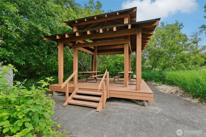 A covered picnic gazebo provides a relaxing spot to gather, dine outdoors or enjoy the natural surroundings. A covered picnic gazebo provides a relaxing spot to gather, dine outdoors or enjoy the natural surroundings.