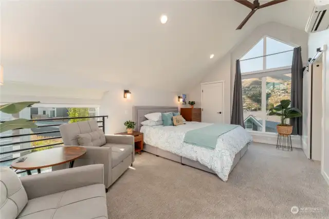 View 2 of Upper Level Primary Bedroom w/ on-suite bathroom w/ double twin sleeper chairs.