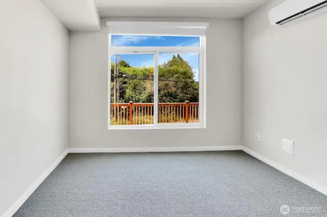 Entry level bedroom/office in homesite 2. This home features berber carpet with 8# pad! Carpet areas: Stairs, bedrooms. Entire Living/Kitchen/Dining is LVP!