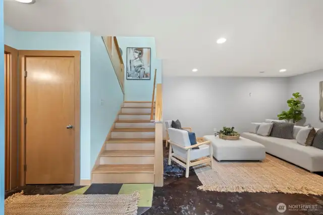 Ground floor entryway w/ stairs to upper main floor living.
