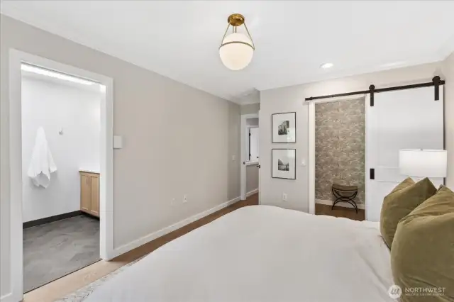 Large primary bedroom with ensuite bathroom and walk-in-closet