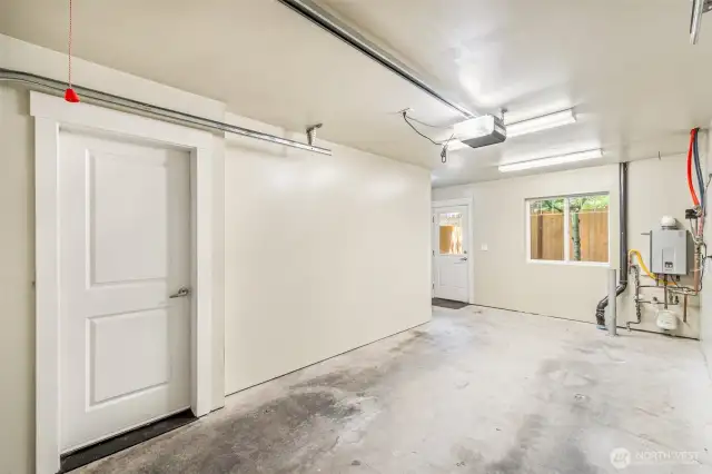 Large garage with tons of storage.