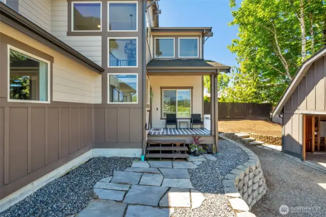 Oversized windows invite abundant sunshine, creating a warm & airy atmosphere.