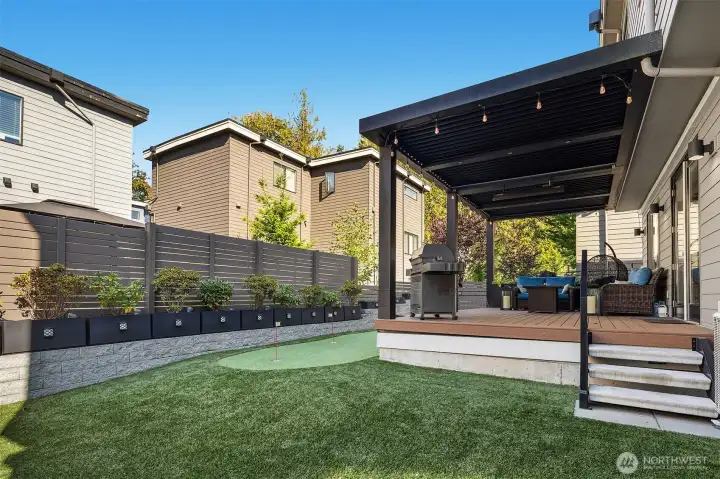 Garden spaces and partially fenced yard