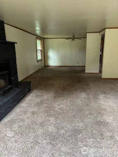 Interior picture of front room looking down towards the dining room