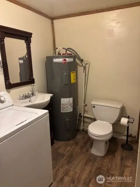 2nd bathroom serves as the utility room with the hot water tank