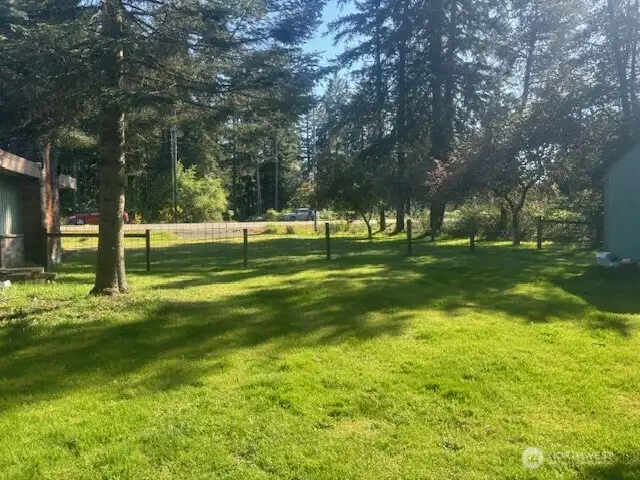 photo of back yard facing Sedgwick rd with partial picture of outdoor shed