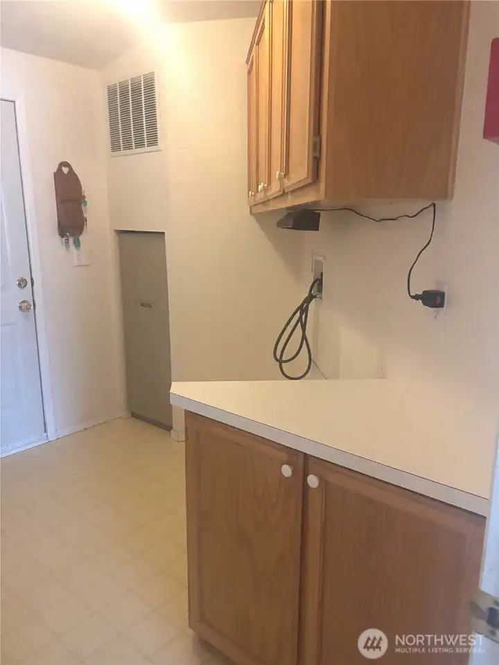 Laundry room leads to garage