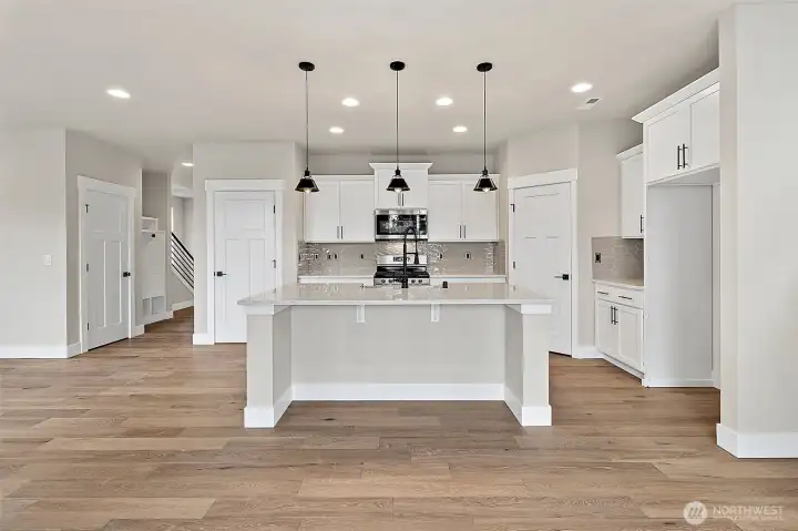 Photos are of the 2200 plan built at a different community. Details and finishes will vary. Ask Agent for details.