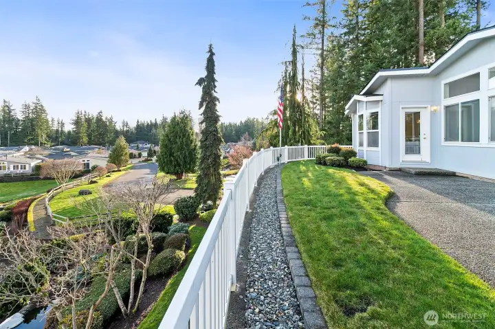 Built in privacy with this homes location backing up to nature