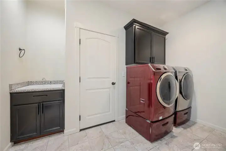 Laundry/Mudroom with deep soaking sink.
