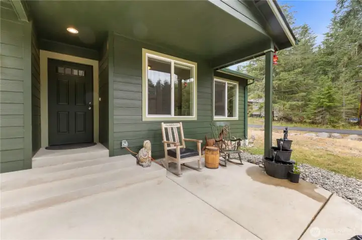 Welcoming poured concrete patio entry.