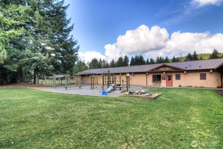 Community Center with attached stables and caretaker office.